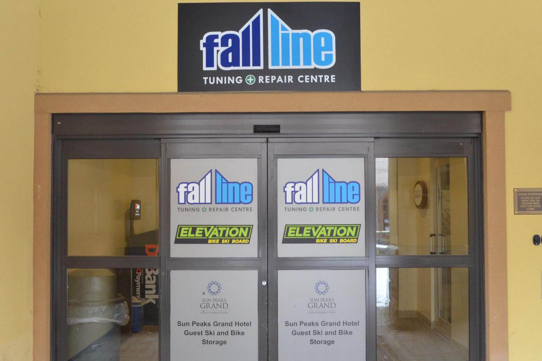 Double doors with Fall Line logo on them 