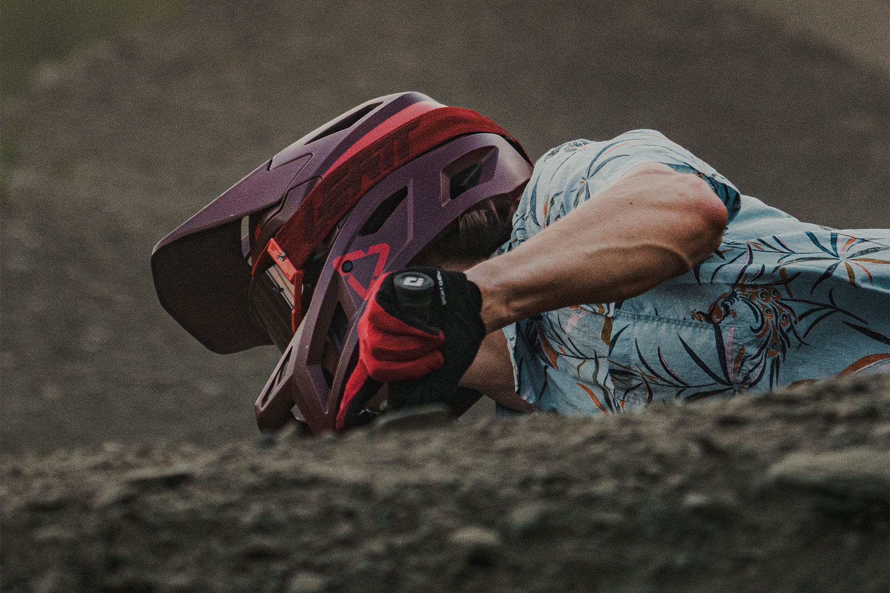 Closeup of mountain biker riding a berm