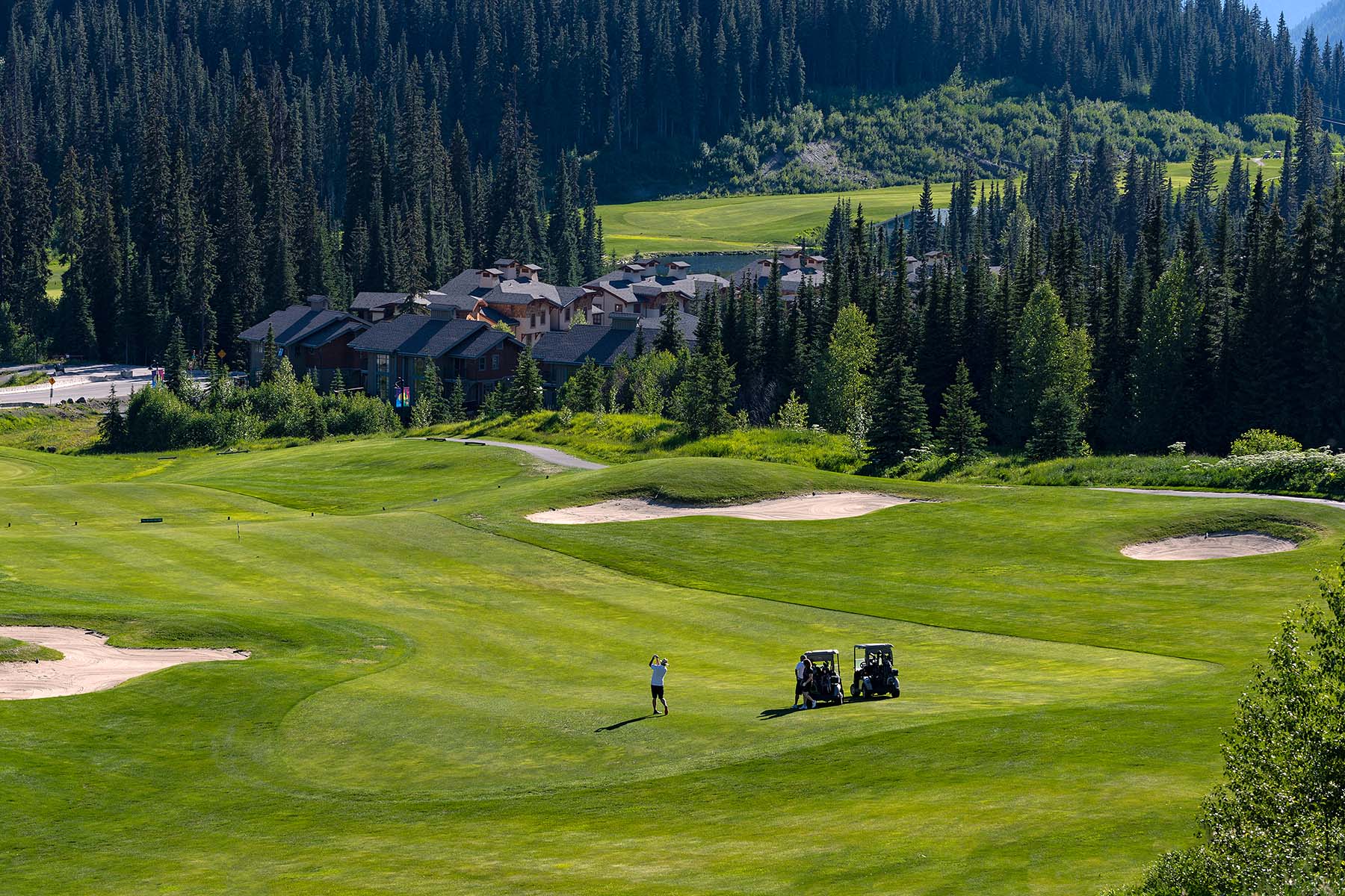Golfing in sun peaks with wide golf course view