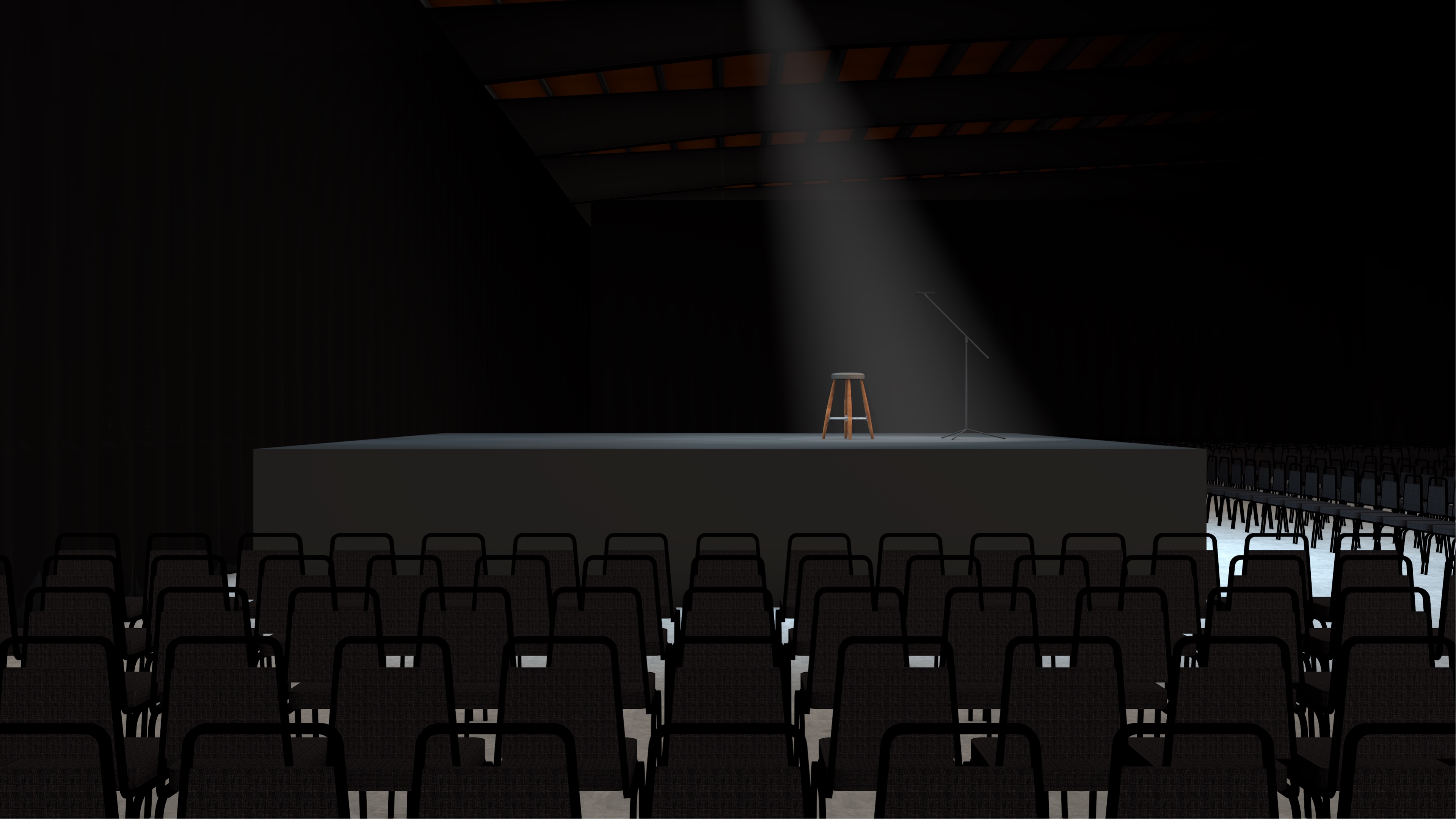 Concert venue mockup with a single stool in a spotlight.
