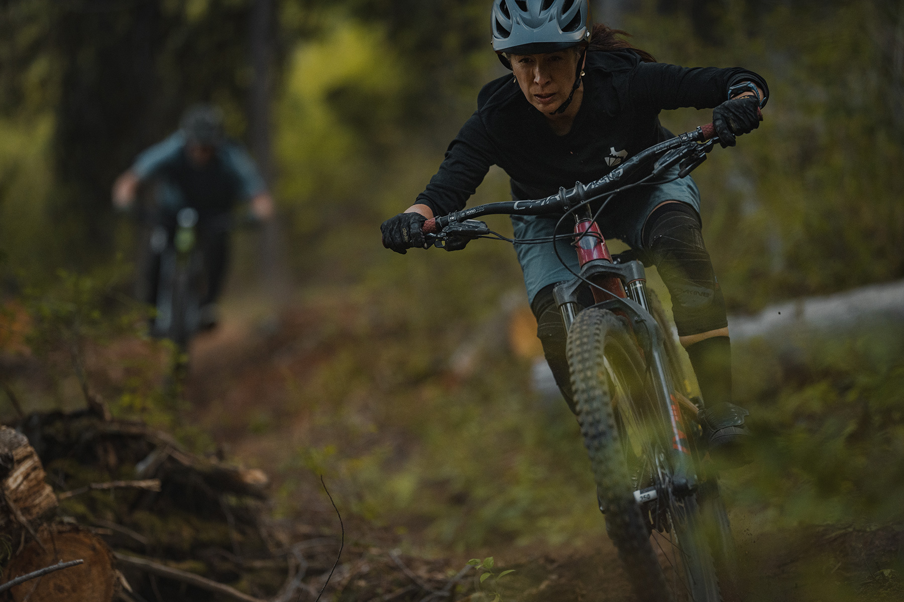 Kelly Kozevnikov riding on Mt. Morrisey with second rider behind