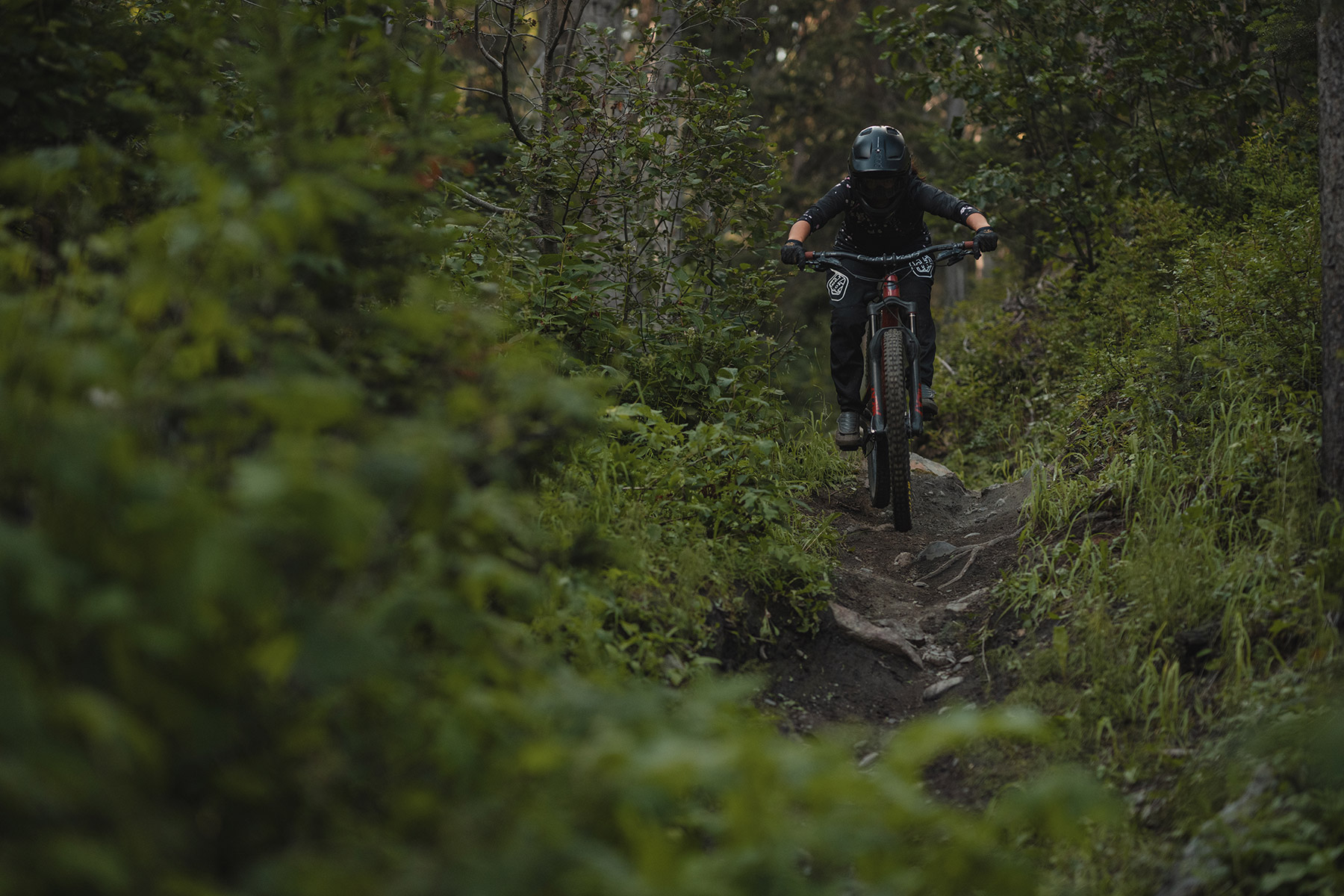 Kelly Kozevnikov riding DH tech trail in the Sun Peaks Bike Park