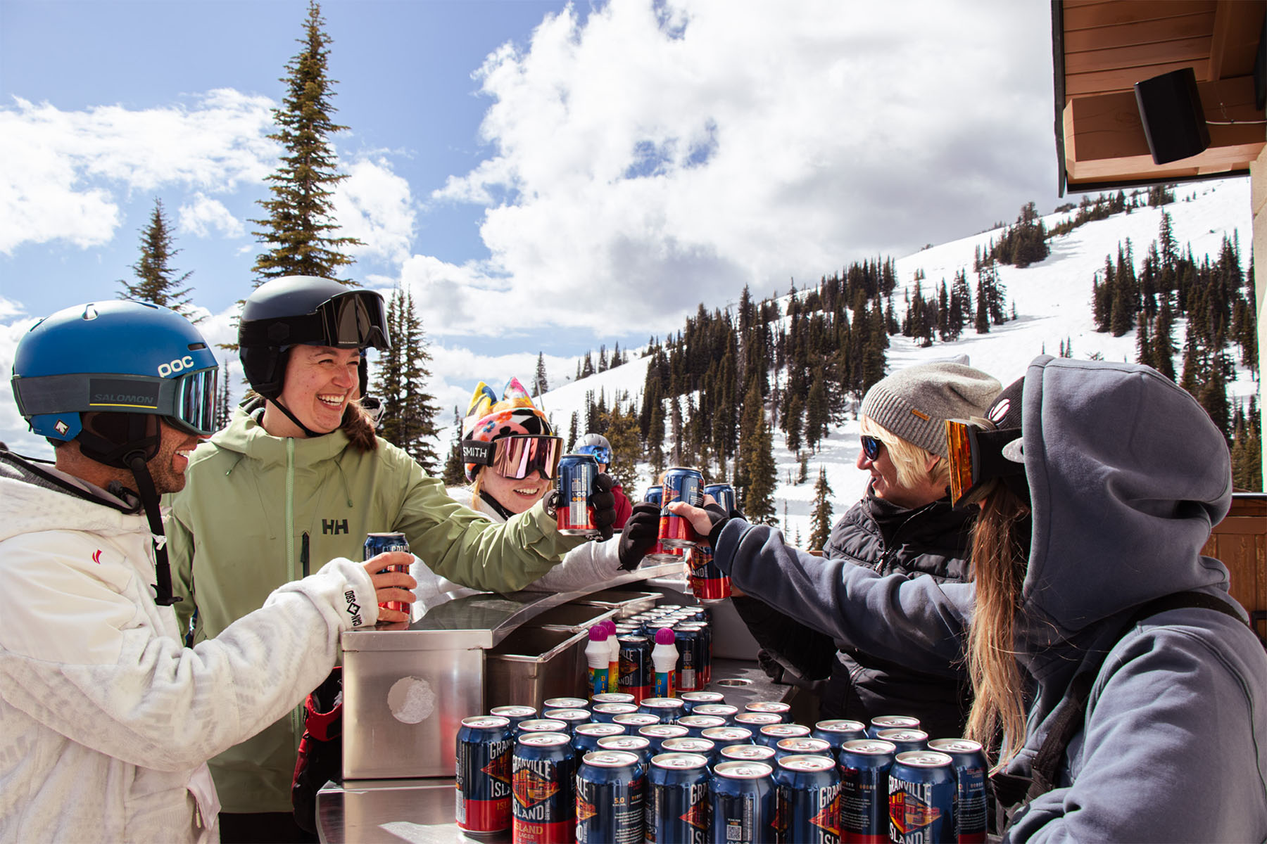 Couple grabbing beers from the bar at Lift and Lager at the Sunburst Lodge.