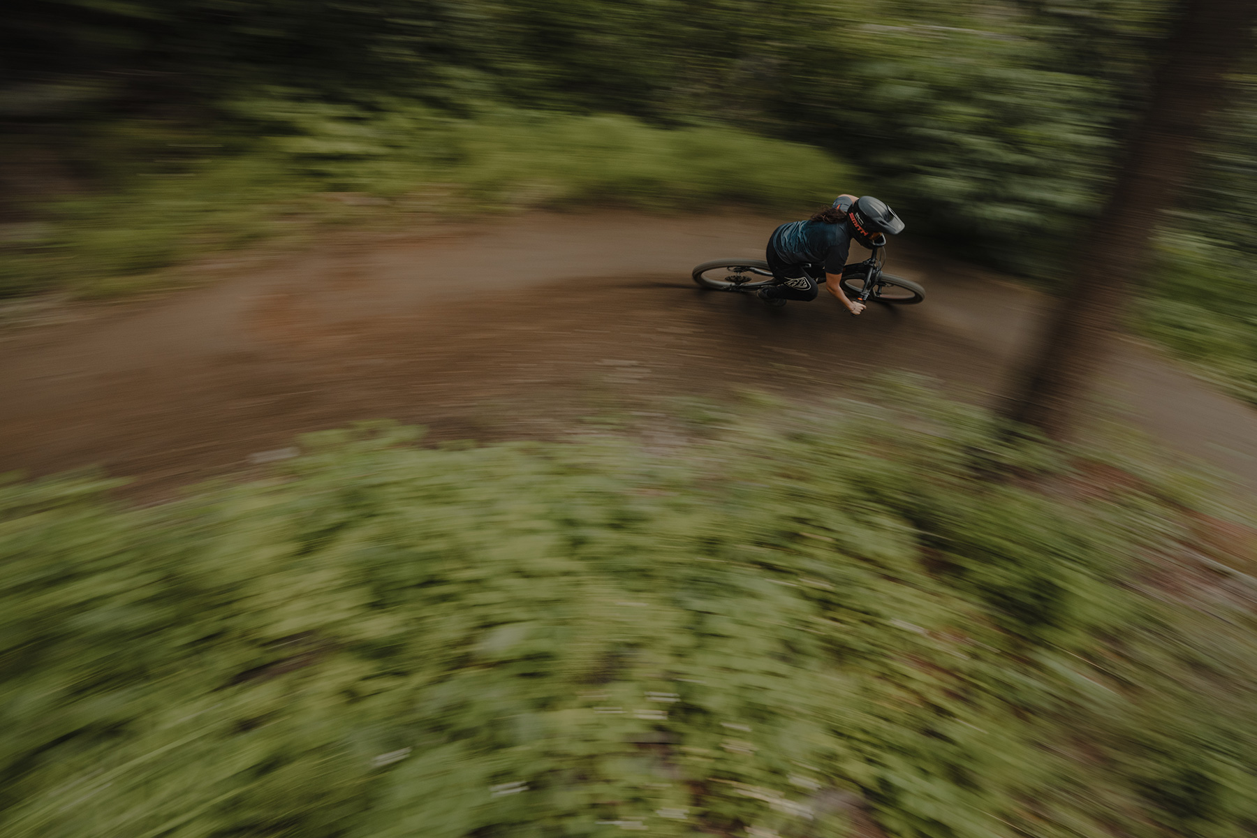 Pan shot of DH rider in the Sun Peaks Bike Park