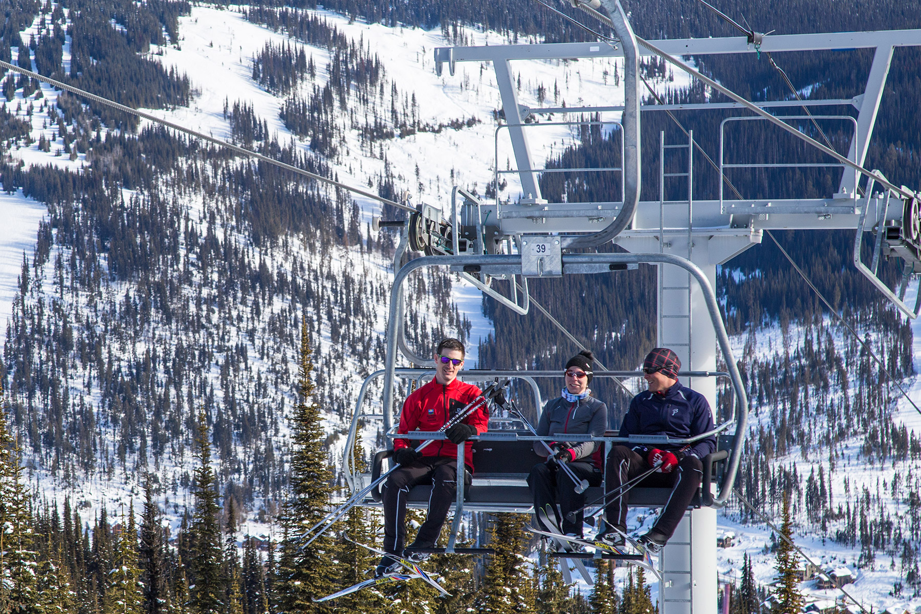 Nordic skiers riding the Morrisey chairlift