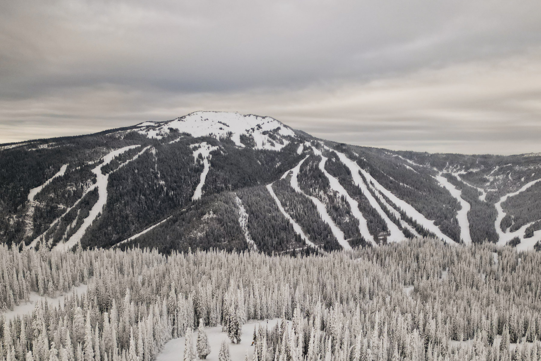 View of the ski runs on Tod Mountain on a cloudy day