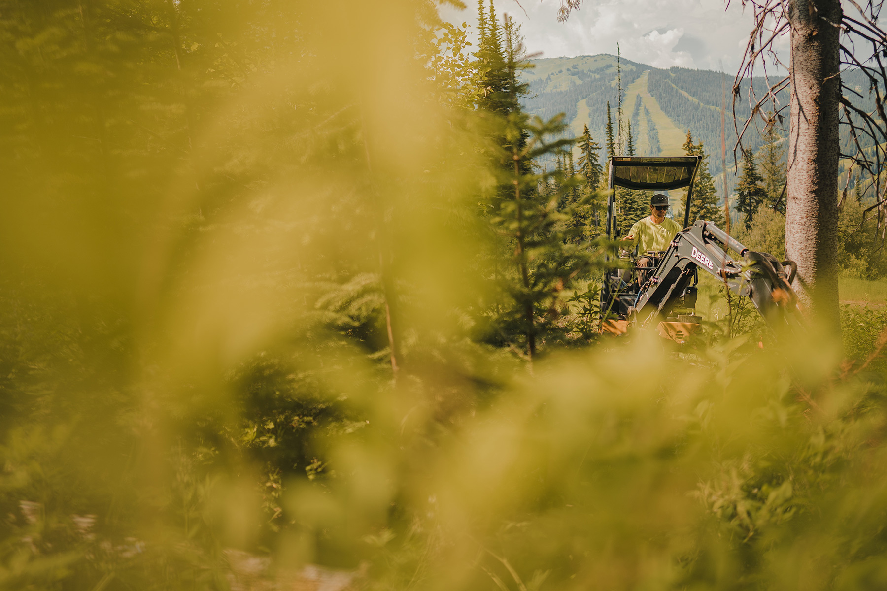 Excavator building a bike trail on Mt. Morrisey