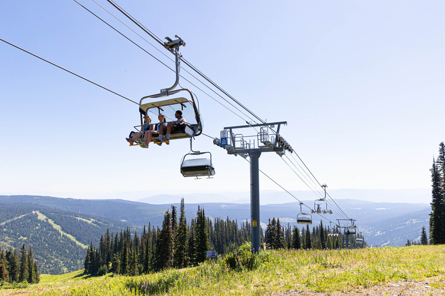 trail runners on chairlift