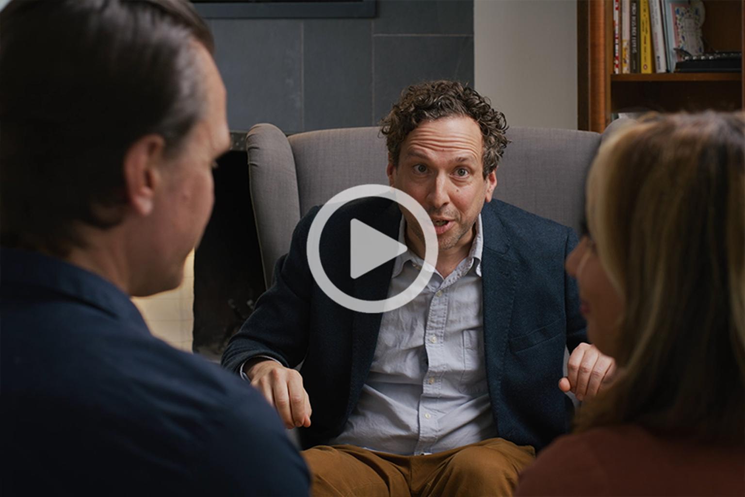 Therapist talking to a couple