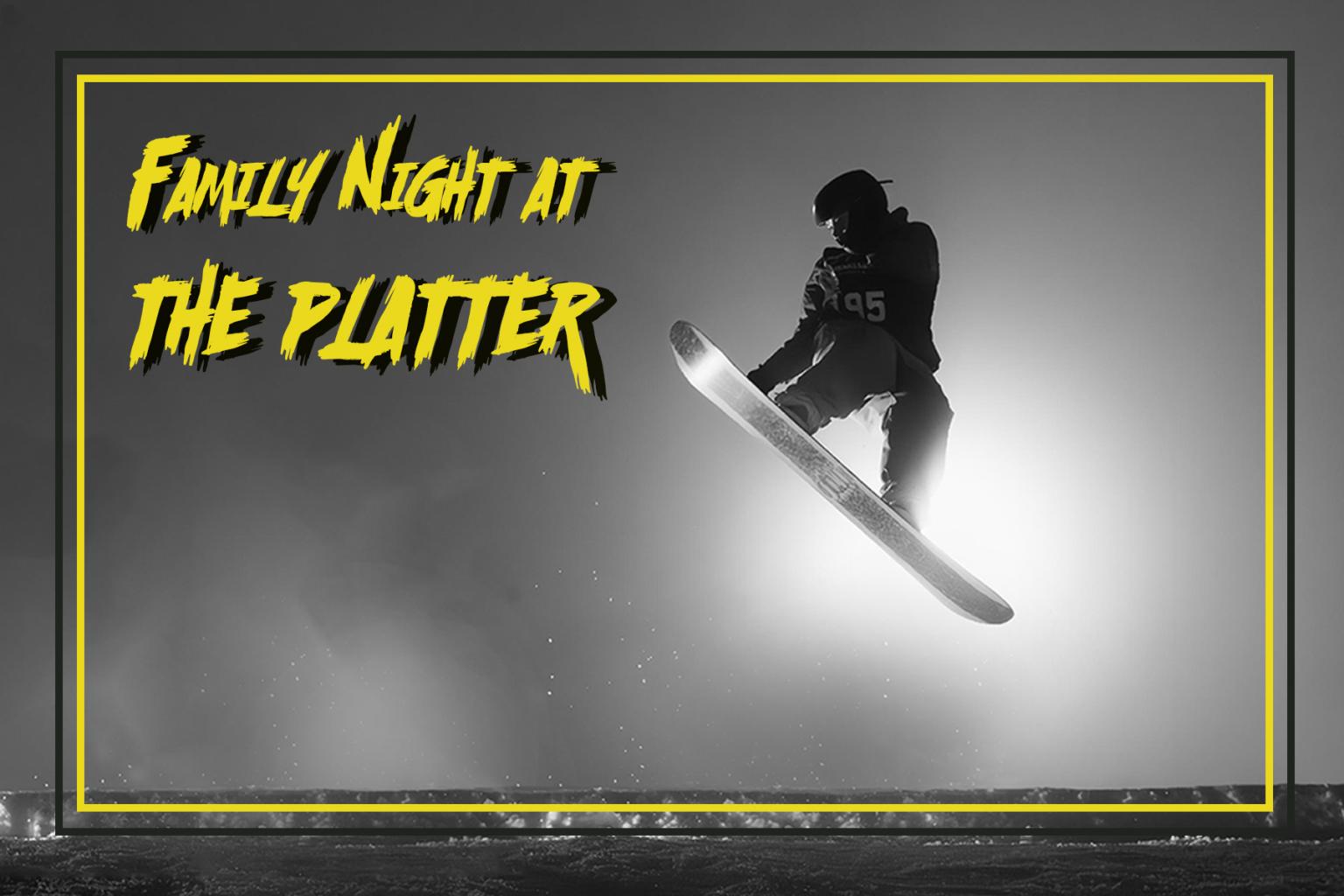 A snowboarder mid-jump in black and white with 'Family Night at the Platter' types on the photo