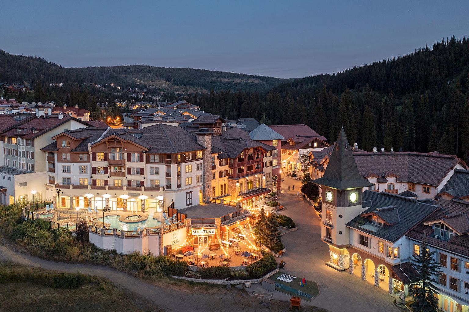 sun peaks village at night with lights on