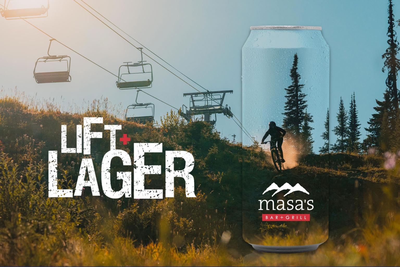 Downhill biker riding under lift line with Lift and Lager logo