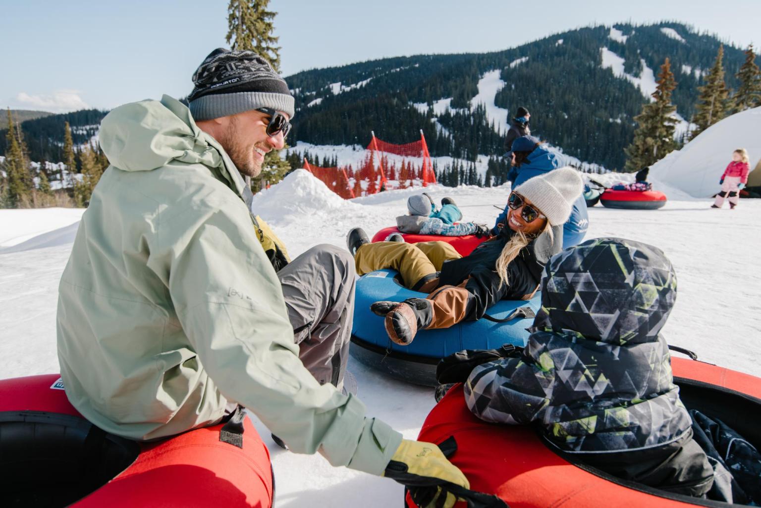 Family at the top of the Tube Time getting ready to descend together