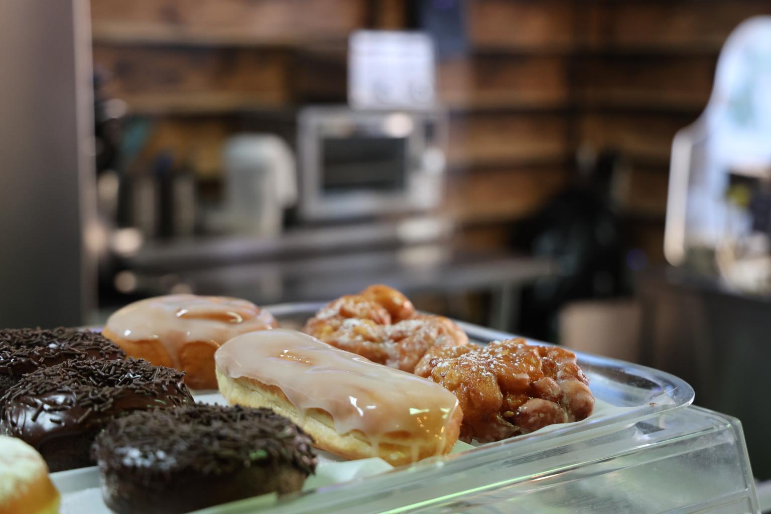 Chocolate sprinkle, glazed, and apple fritter donuts at Baby Doh's in Sun Peaks.