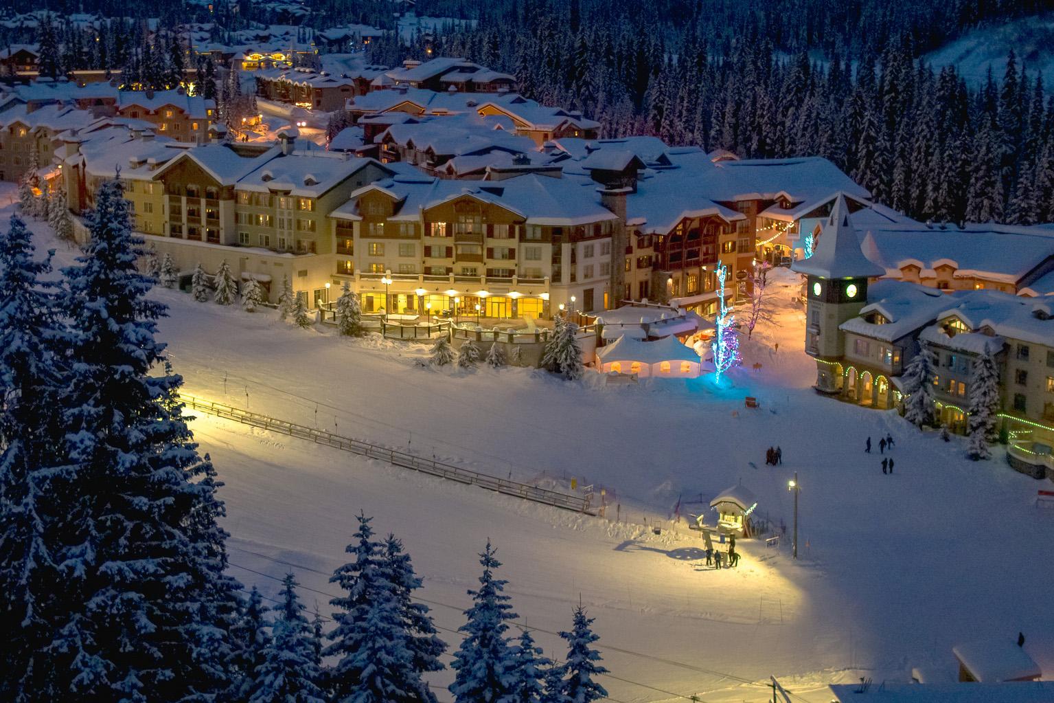 Sundance base in winter with the village warmly lit.