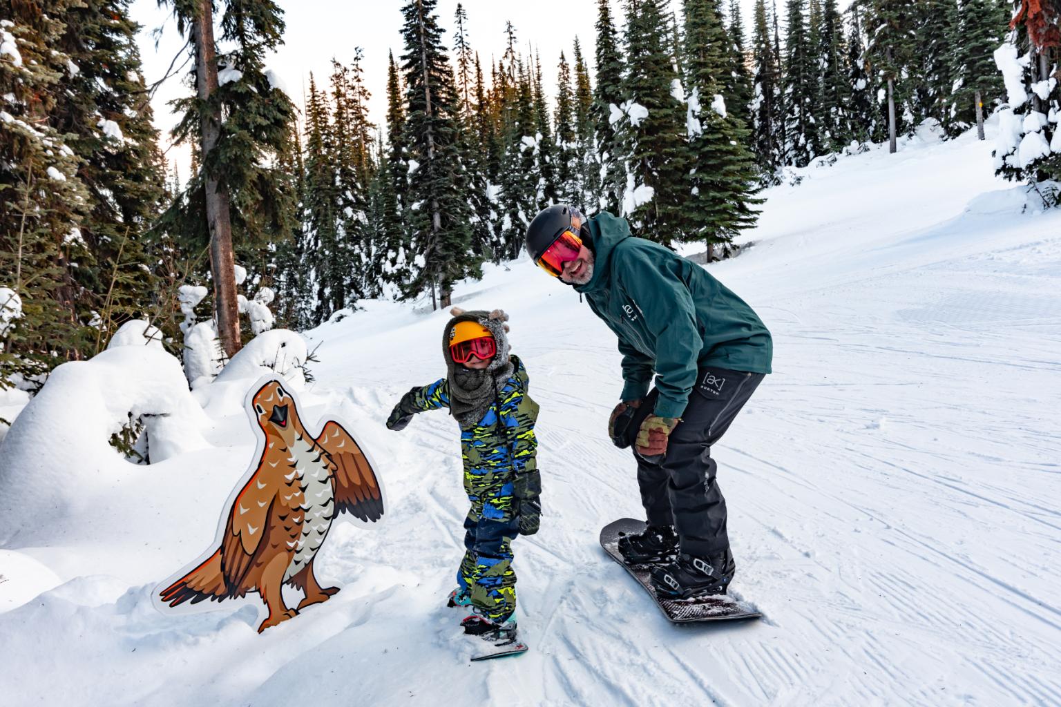 Young child with father at the Kid Zone Grouse's Nest