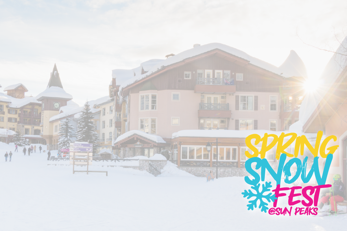 Snowy village street with sunlit buildings and festive text overlay.