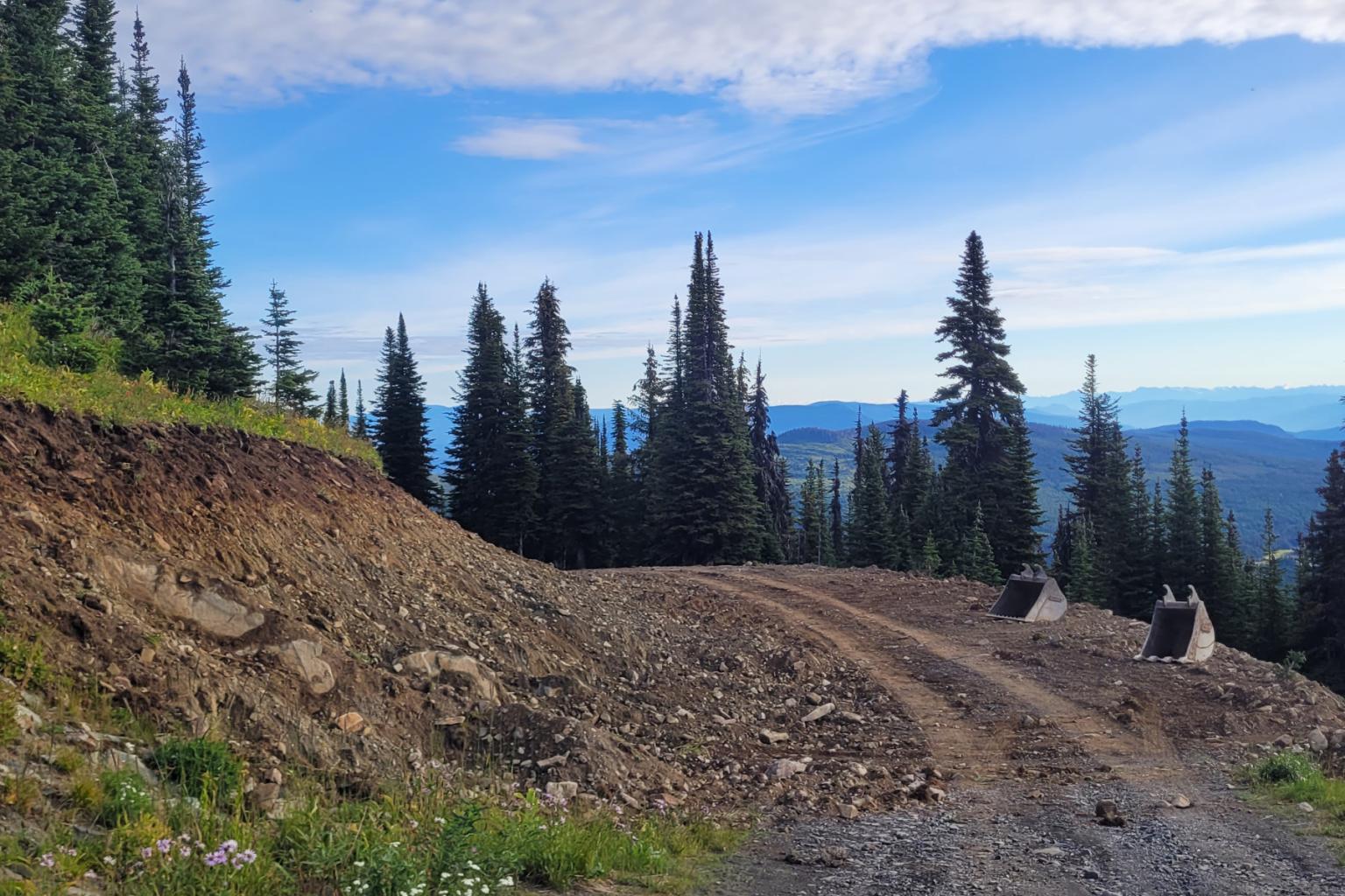 Widening a narrow section of Upper 5 Mile above Rice Bowl. 