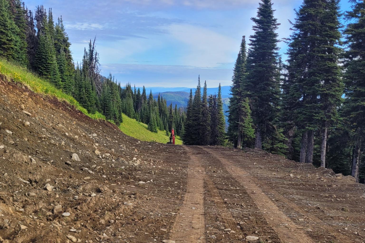Widening a narrow section of Upper 5 Mile located above Last Chance.