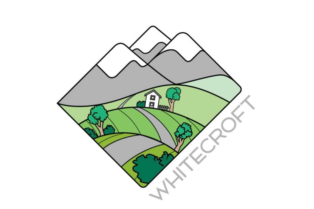 Community Association of Whitecroft stylized landscape logo with mountains and trees.