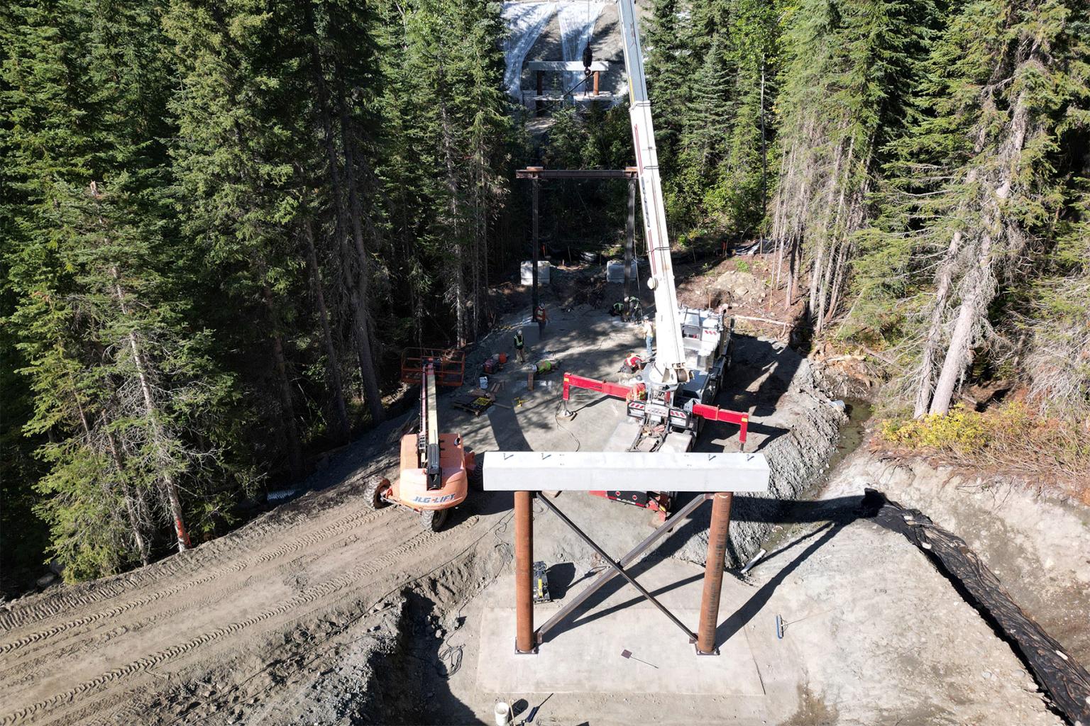 Progress on the McGillivray Ski-Back bridge continues, connecting skiers to the East Village and new Switchback Creek townhomes.