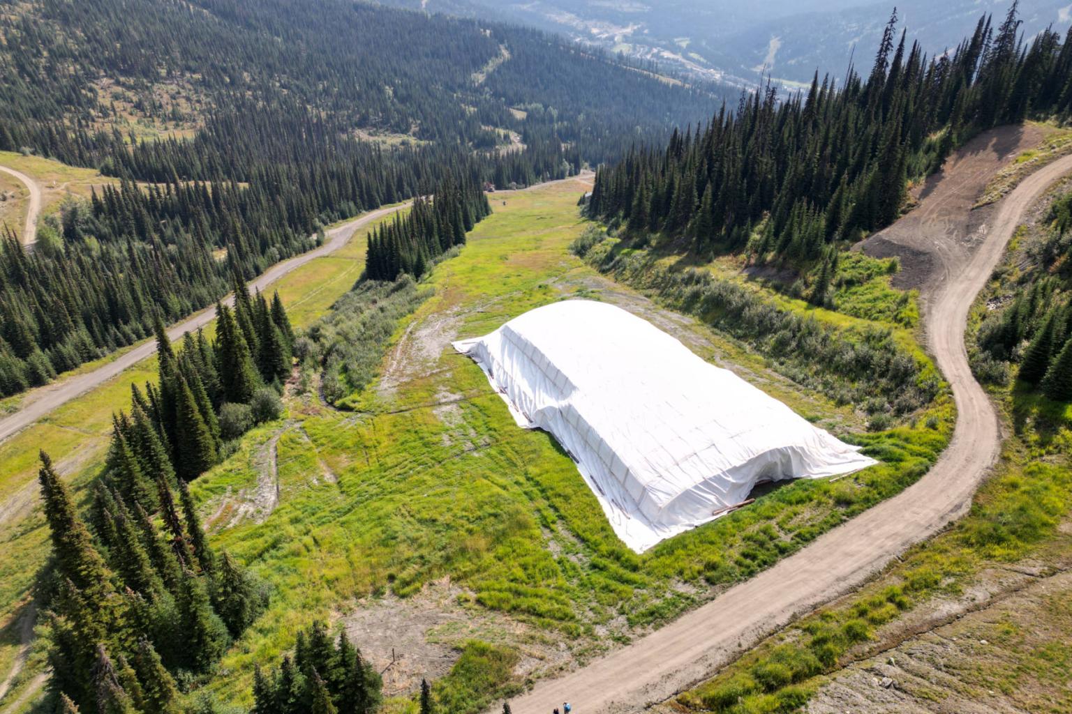 Snow storage on OSV trail. Photo taken September 2025. 