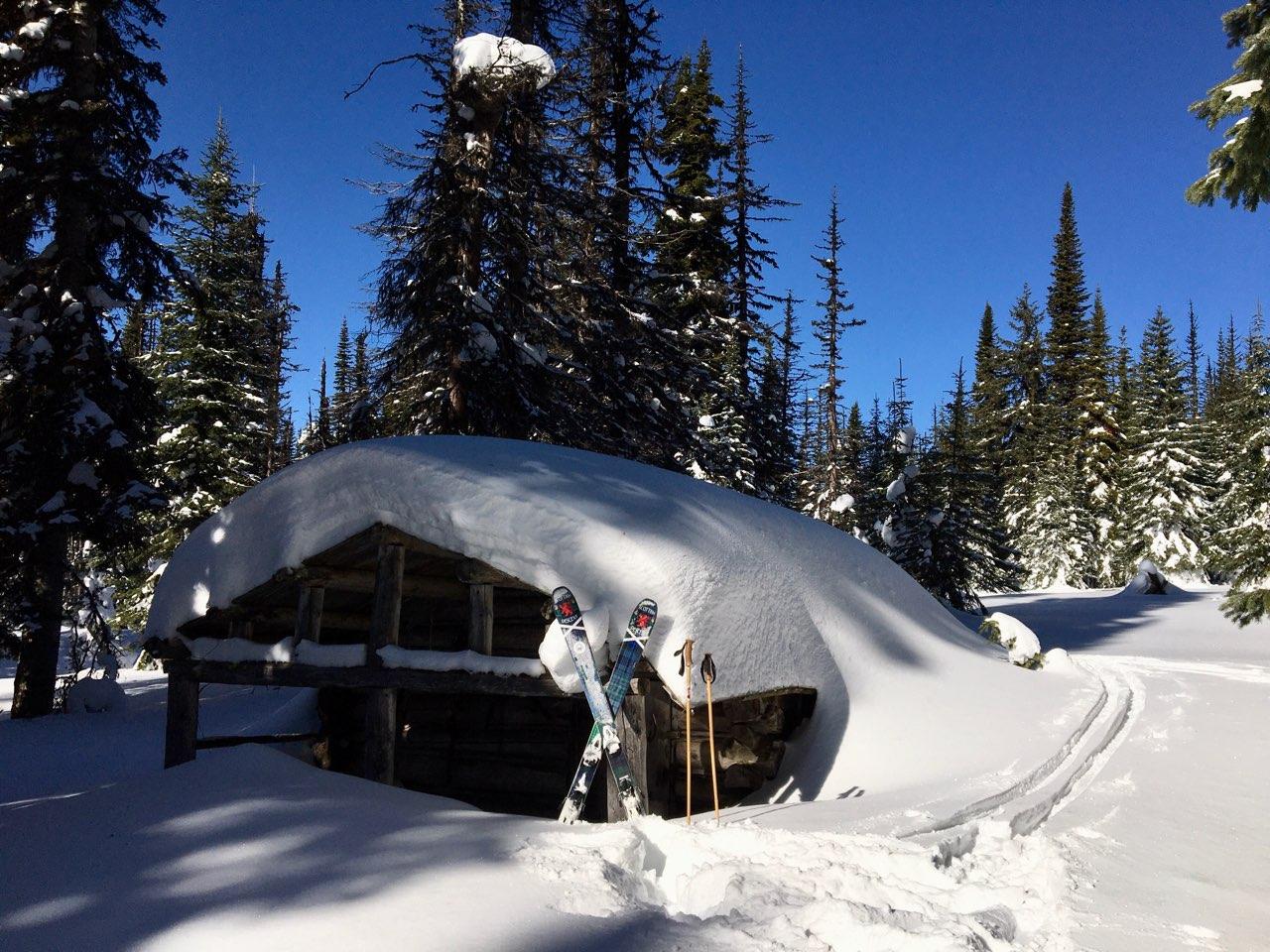 Snow-covered Herder cabin in winter.