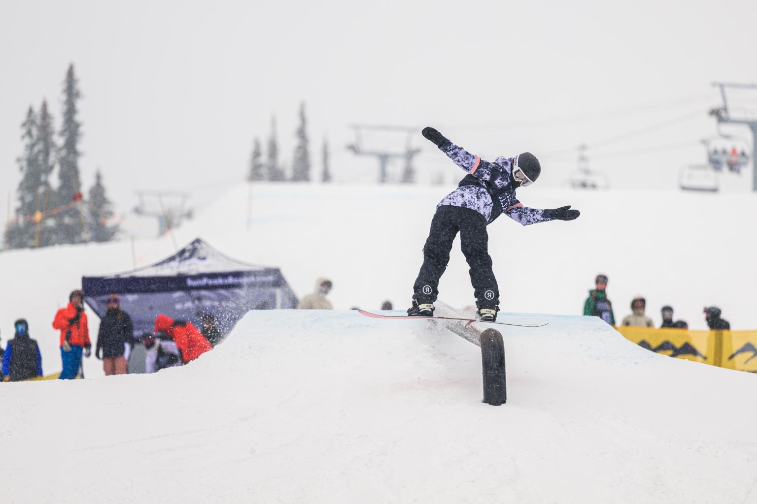 Snowboarder on a rail