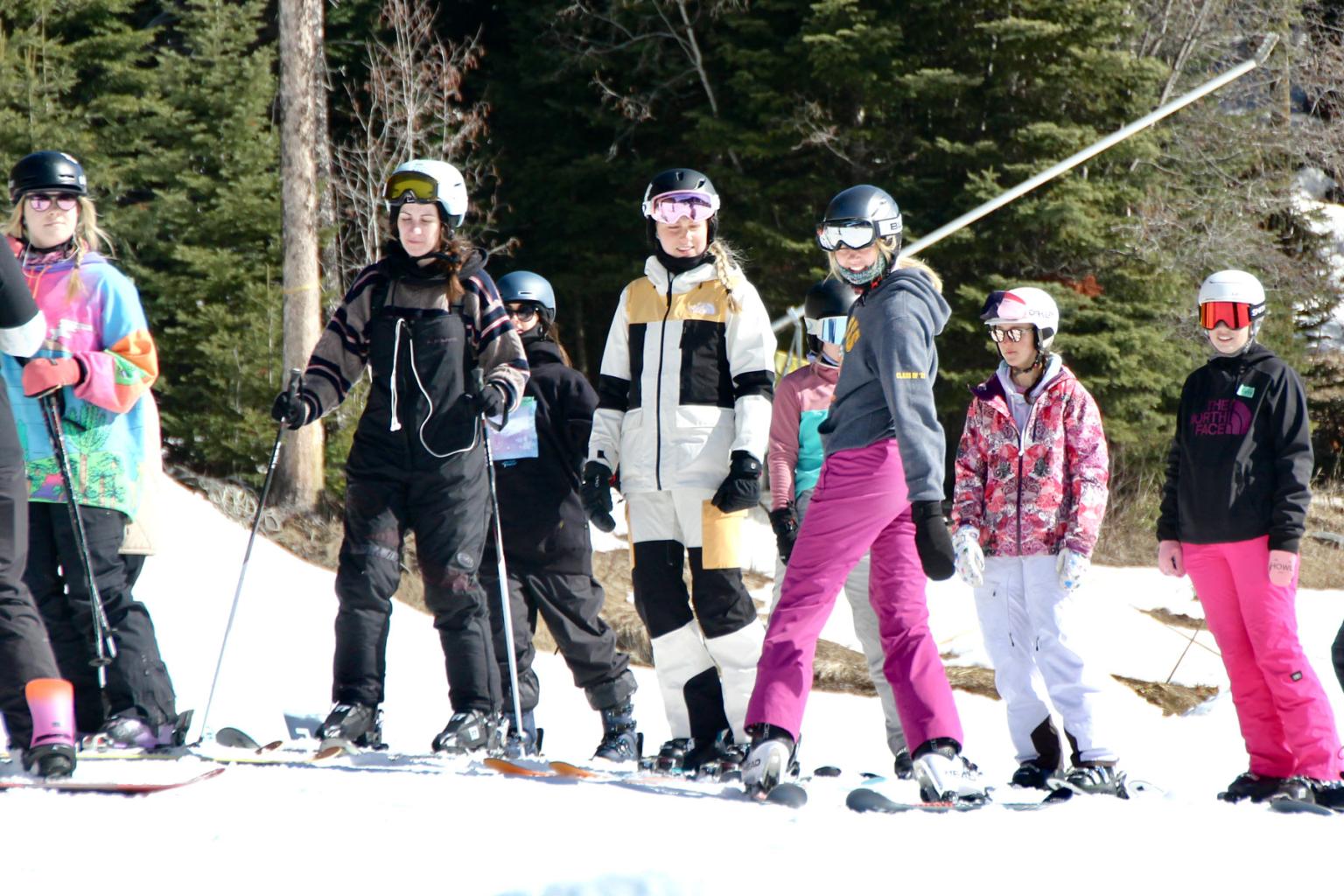 Group of women skier and boarders