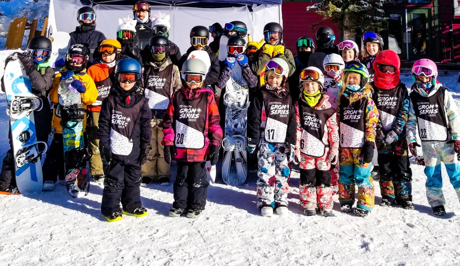 Group of kids snowboarders