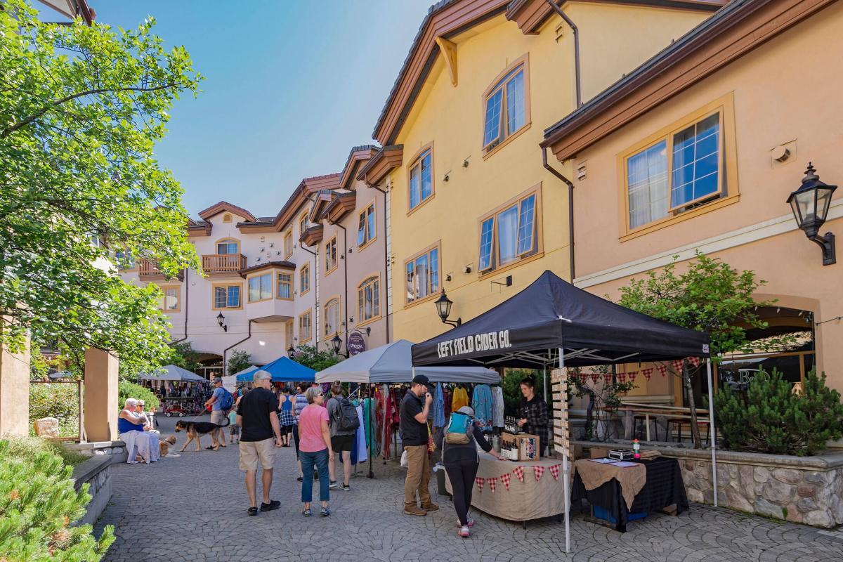 Village walk with market vendors