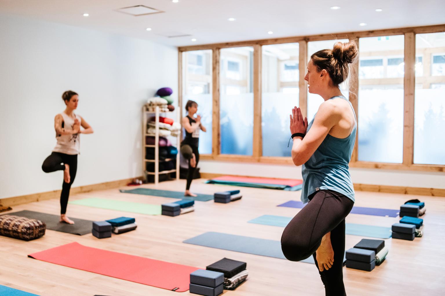 People participating in a yoga class