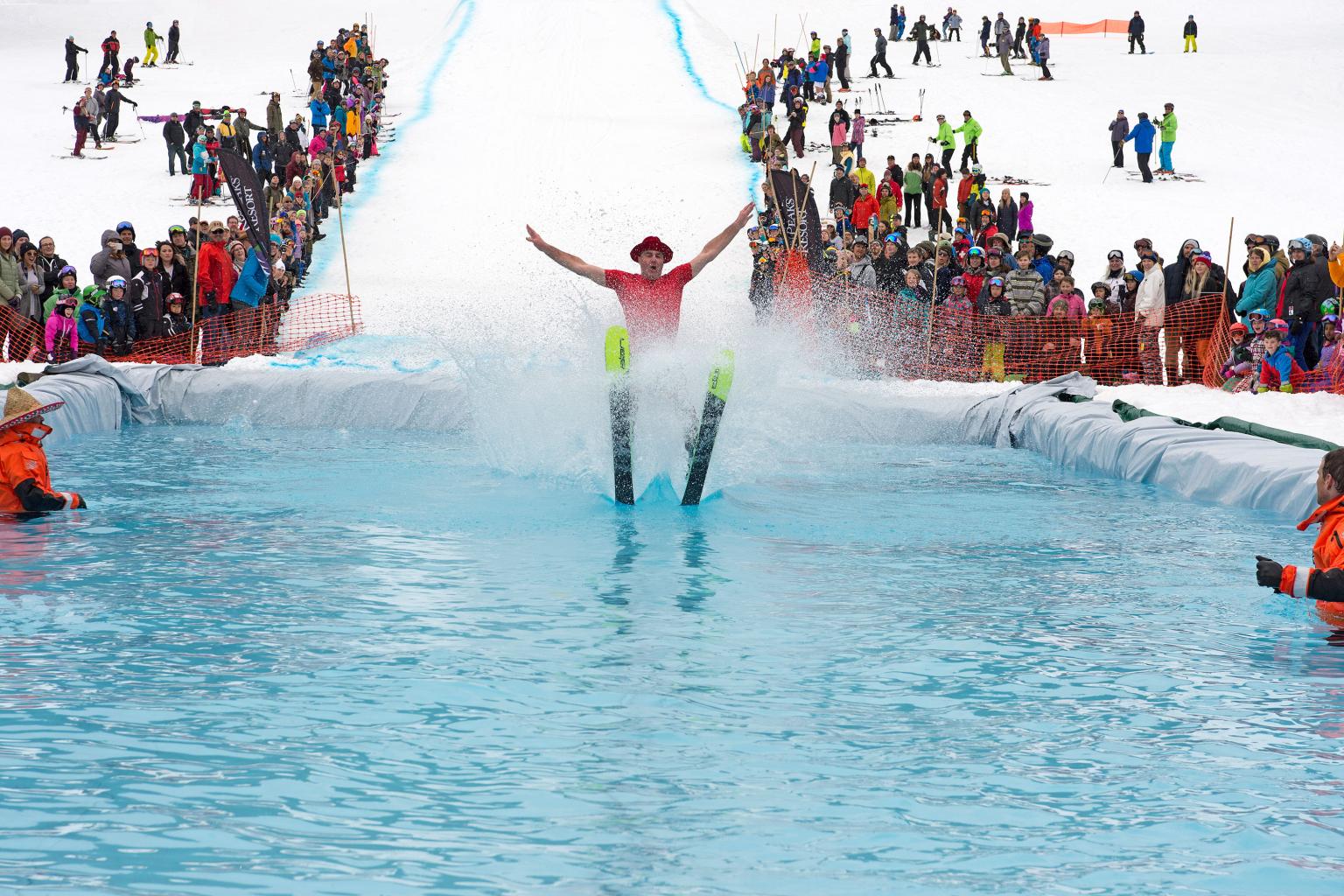 Skier skimming over a water for Slush Cup