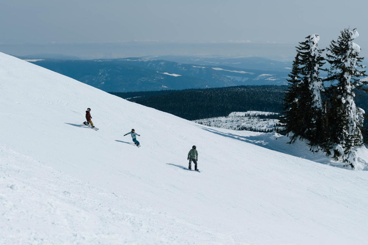 Cooler temperatures and winter skiing conditions stick around longer up at the top of the mountain. Head lower down each mountain and into the sunshine to find softer spring skiing conditions.
