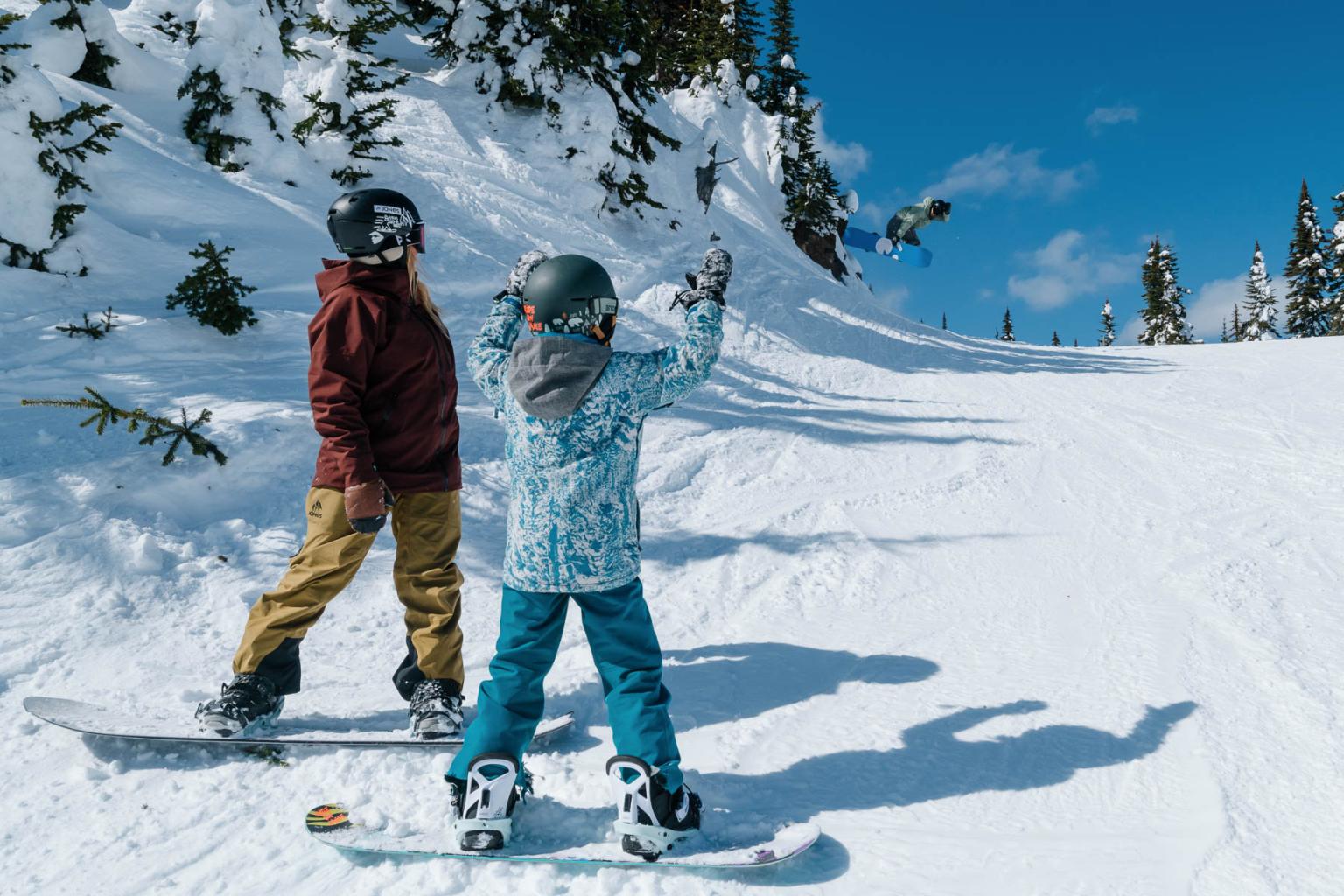 family snowboarding in sun peaks